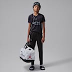 Paris Saint-Germain Strike (fjerdedrakt) Jordan Dri-FIT strikket fotballbukse til store barn