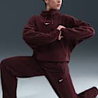 Pantaloni in fleece a vita media Therma-FIT Nike One – Donna