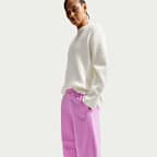 Pantalones entubados de tiro medio holgados para mujer Nike Sportswear Phoenix Fleece