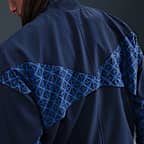 เสื้อแจ็คเก็ตฟุตบอลประจำทีมผู้ชาย Nike Dri-FIT Paris Saint-Germain Strike Home