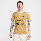 Playera de fútbol de manga corta Nike Dri-FIT para antes del partido para hombre Pumas UNAM Academy Pro