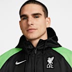 Liverpool F.C. Sport Essentials Windrunner Men's Nike Hooded Football Jacket