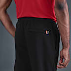 NikeCourt Heritage Dri-FIT tennisjoggingbroek van fleece voor heren