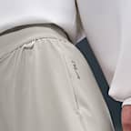 Pants Dri-FIT de tiro alto de pierna holgada y tipo barril para mujer Nike 24.7 PerfectStretch