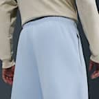 Pánské flísové kalhoty Nike Solo Swoosh s manžetami