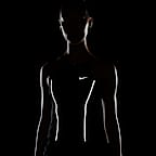 เสื้อกล้ามบราผู้หญิงซัพพอร์ตระดับกลางเสริมฟองน้ำ Nike