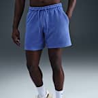 Shorts de alto rendimiento Dri-FIT de 18 cm sin forro con protección UV para hombre Nike Primary Fleece