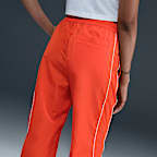 Pants con dobladillo abierto de tejido Woven de tiro alto para mujer Nike Windrunner