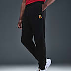 NikeCourt Heritage Dri-FIT tennisjoggingbroek van fleece voor heren