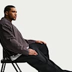 Pants de tejido Fleece de ajuste holgado con dobladillo abierto para hombre Nike Tech