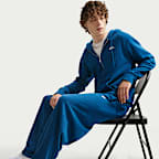 Ανδρικό παντελόνι σε φαρδιά γραμμή από French Terry ύφασμα Nike Sportswear Club