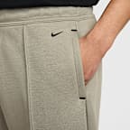 Pants de tejido Fleece de piernas anchas para hombre Nike Tech