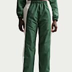 Γυναικείο παντελόνι φόρμας μεσαίου καβάλου σε φαρδιά γραμμή Nike Sportswear