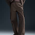 Pants cargo de tiro medio para mujer Nike Sportswear Everything Wovens