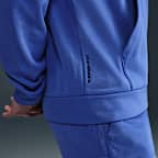 Top de fitness de cierre completo Therma-FIT para hombre Nike Therma