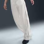 Pants con dobladillo abierto de tejido Woven de tiro alto para mujer Nike Windrunner