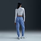 Pants de entrenamiento de tiro medio para mujer Nike Sportswear Phoenix Fleece