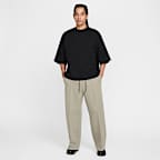 Pants de tejido Fleece de piernas anchas para hombre Nike Tech