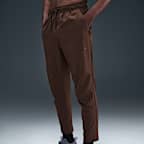 Pants versátiles Dri-FIT de pierna entallada para hombre Nike Unlimited