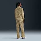 Chamarra de tejido Woven estampada y holgada de cierre completo y protección contra los rayos UV para mujer Nike Sportswear Windrunner