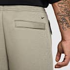Pants de tejido Fleece de piernas anchas para hombre Nike Tech