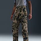 Nike Tech fleecebroek met camouflageprint met open zoom voor heren