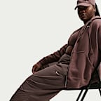 Pants de tejido Woven de tiro alto oversized para mujer Nike Sportswear (talla grande)