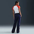 Dámské úpletové kalhoty Nike Sportswear Windrunner v zeštíhleném střihu se středně vysokým pasem