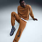 Pants de tejido Fleece con puños para hombre Nike Sportswear Club