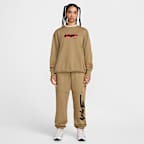 Nike Sportswear Breaking Women's Mid-Rise Oversized French Terry Trousers