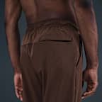 Pants versátiles Dri-FIT de pierna entallada para hombre Nike Unlimited