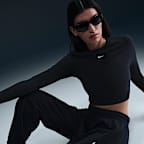 Pants de entrenamiento de French Terry oversized de tiro alto para mujer Nike Sportswear Phoenix Fleece