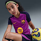 Fotbalové tričko Nike Dri-FIT FC Barcelona Strike s krátkým rukávem pro větší děti