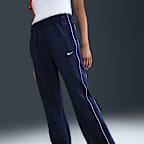 Dámské úpletové kalhoty Nike Sportswear Windrunner v zeštíhleném střihu se středně vysokým pasem