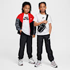 Pantaloni jogger in tessuto Nike Sportswear Club – Ragazzo/a