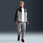 Paris Saint-Germain Tech Windrunner Nike Fußballjacke aus Webmaterial mit durchgehendem Reißverschluss (Herren)