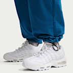 Ανδρικό παντελόνι σε φαρδιά γραμμή από French Terry ύφασμα Nike Sportswear Club