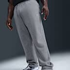 Pantalon en Fleece à ourlet ouvert Nike Club pour homme