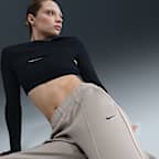 Pantalon de survêtement taille mi-haute à jambes larges Nike Sportswear pour femme