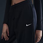 Pants de entrenamiento de French Terry oversized de tiro alto para mujer Nike Sportswear Phoenix Fleece