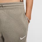 Pants de entrenamiento de tiro medio para mujer Nike Sportswear Phoenix Fleece