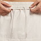 나이키 스포츠웨어 에센셜 여성 미드라이즈 우븐 카고 미디 스커트