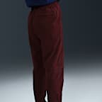 Pantaloni in tessuto Nike Tech – Ragazzo