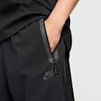 Pánské volné tkané kalhoty Nike Tech