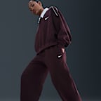 Pantalones entubados de tiro medio holgados para mujer Nike Sportswear Phoenix Fleece