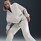 Pants Dri-FIT de tiro alto de pierna holgada y acampanada para mujer Nike 24.7 ImpossiblySoft