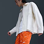 กางเกงขาสั้น Flow ผู้ชายแบบทอ Nike Sportswear Club