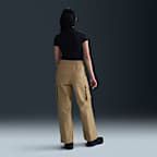 กางเกงคาร์โก้ขายาวเอวปานกลางผู้หญิง Nike Sportswear Everything Wovens