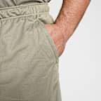 Shorts versátiles Dri-FIT de 18 cm sin forro para hombre Nike Totality
