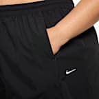 Pants con dobladillo abierto de tejido Woven de tiro alto para mujer Nike Windrunner (talla grande)